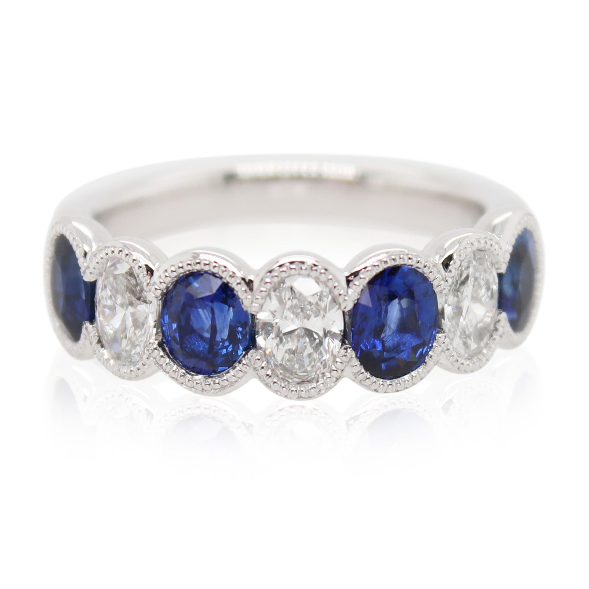 Half Bezel Sapphire and Diamond 7 Stone Ring