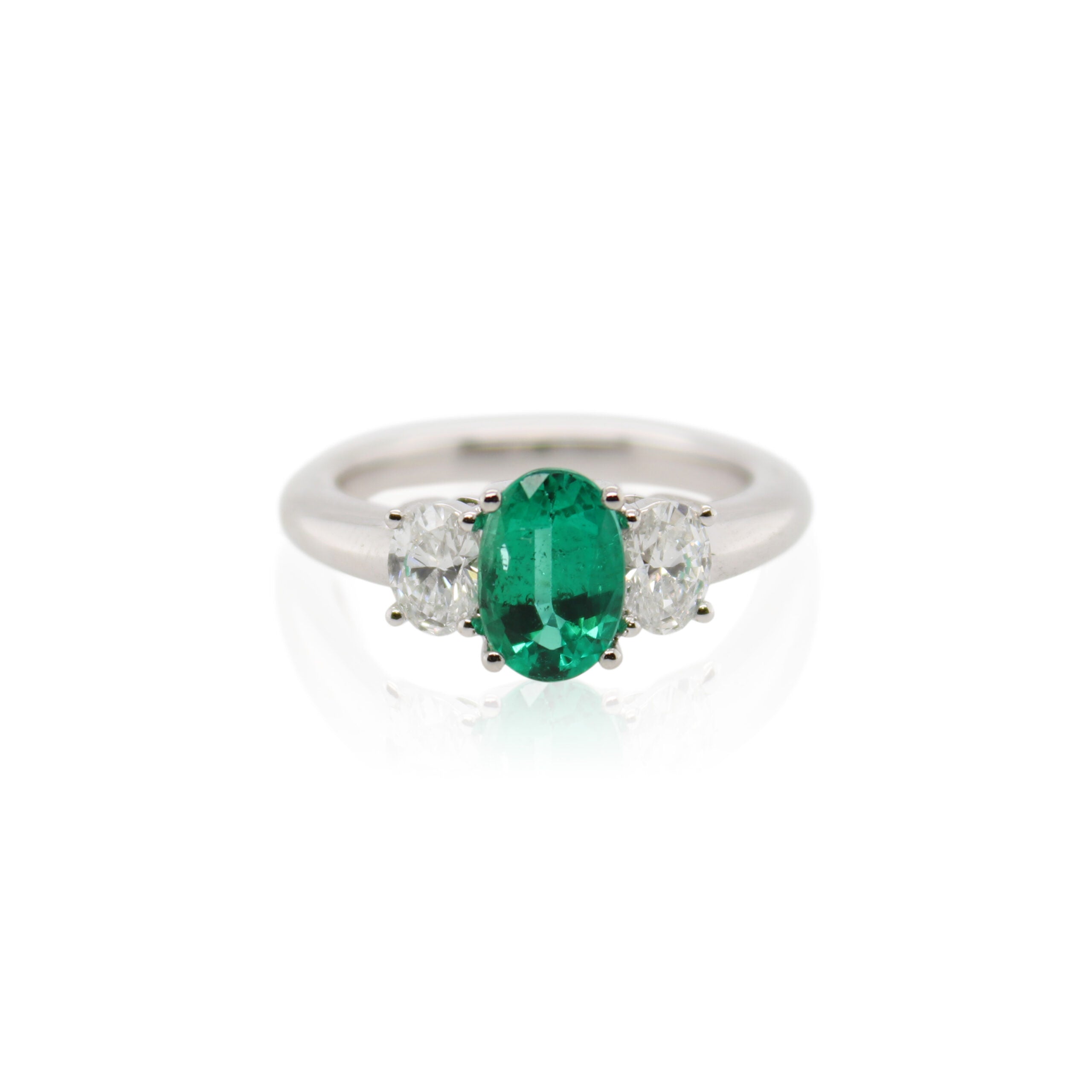 Oval Emerald and Diamond Three Stone Ring
