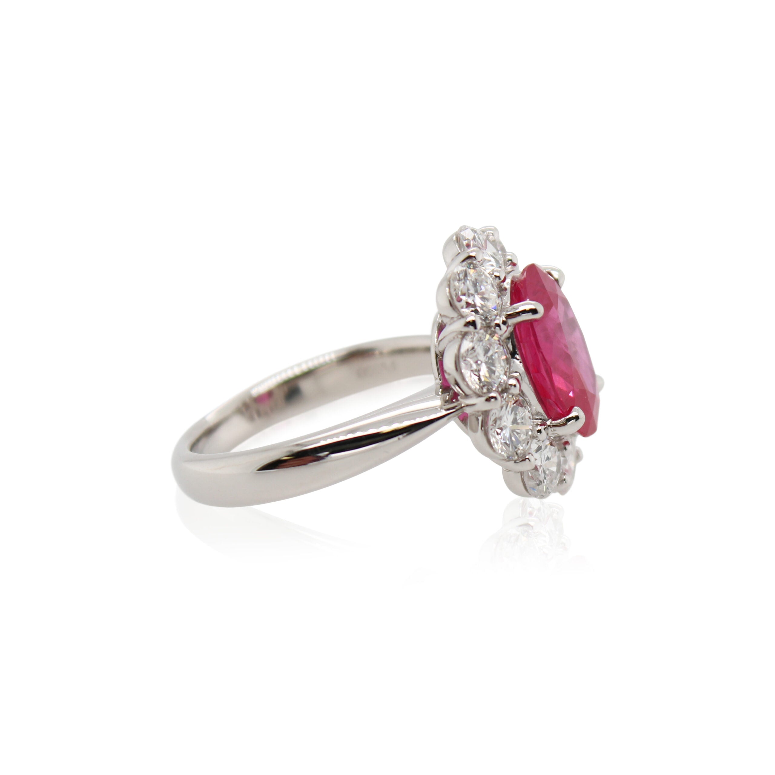 Oval Ruby and Diamond Halo Ring