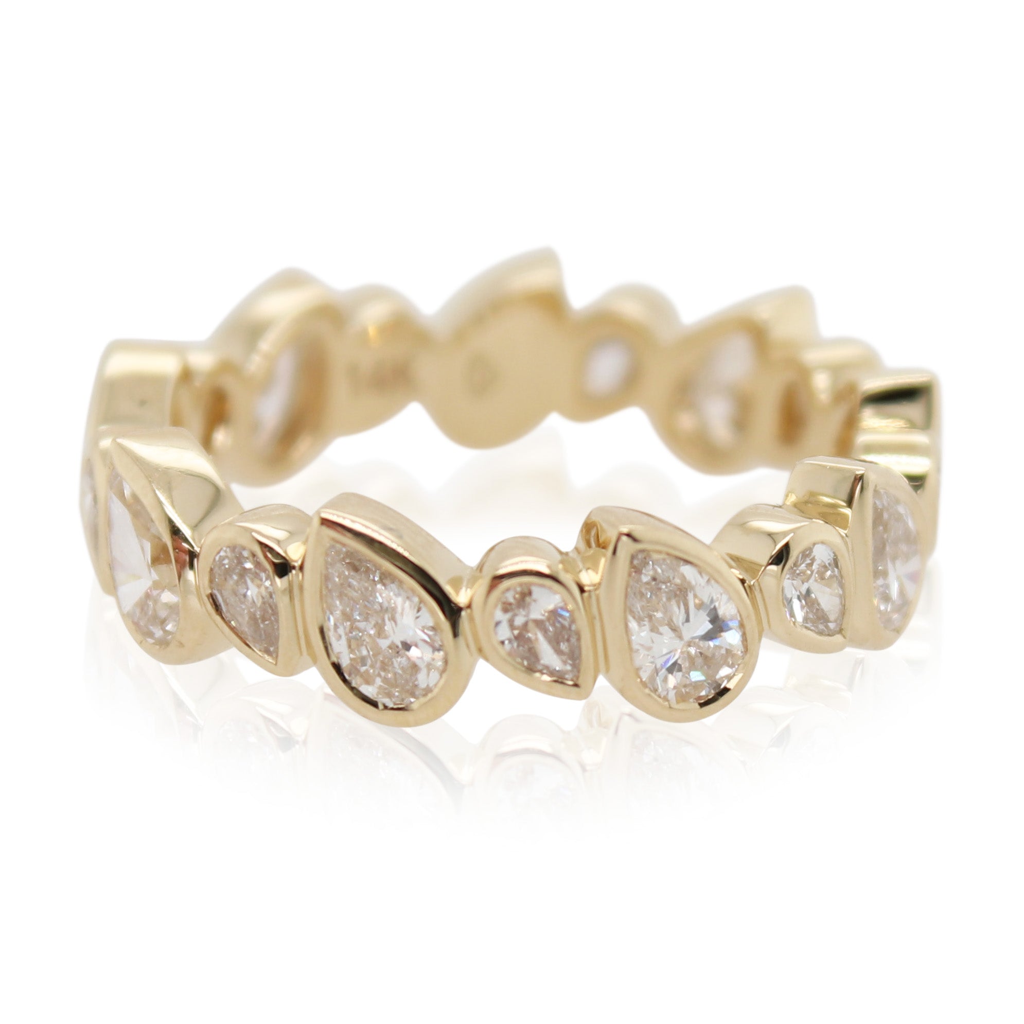 Alternating Bezel Set Pear Shaped Diamond Band
