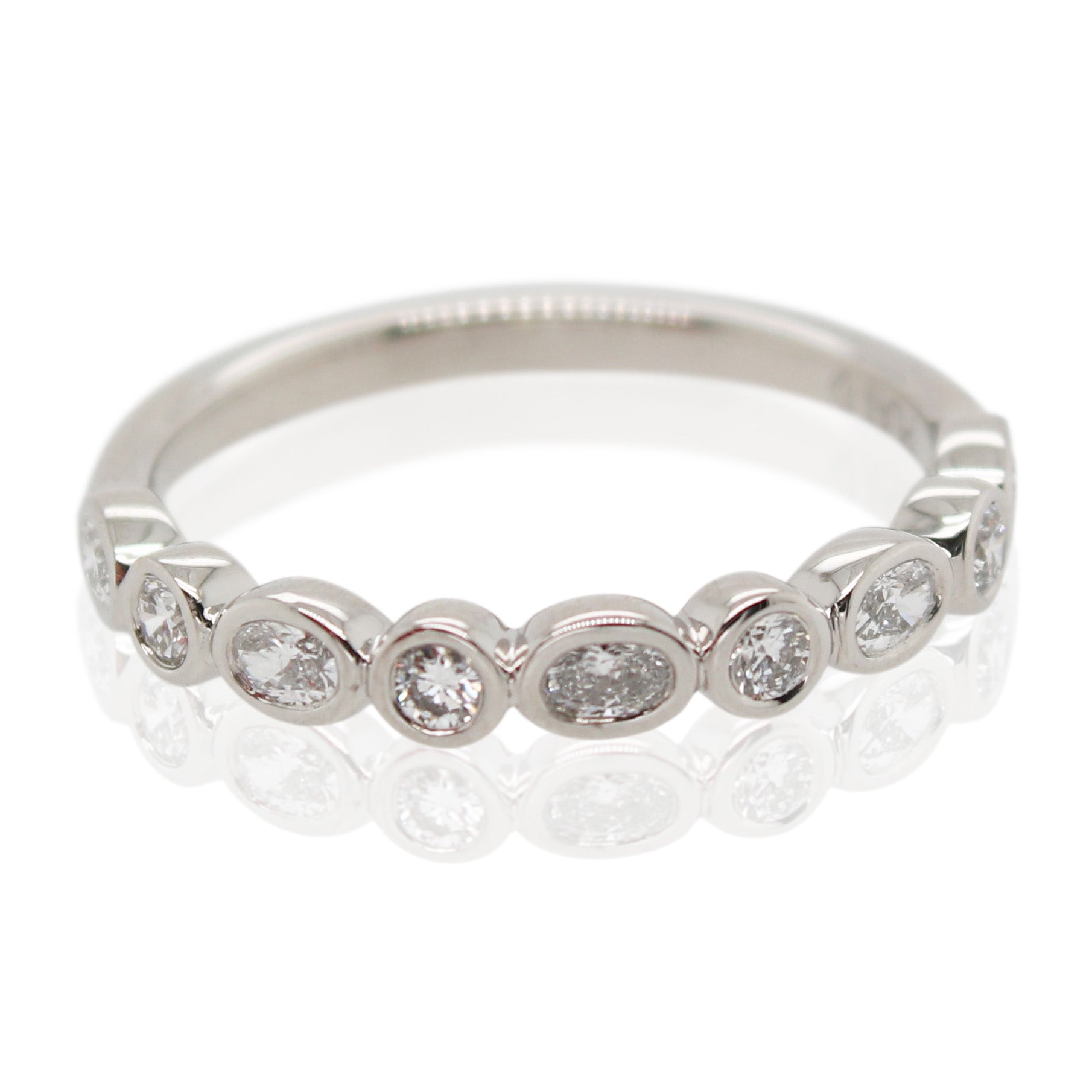 Alternating Bezel Set Round and Oval Diamond Band