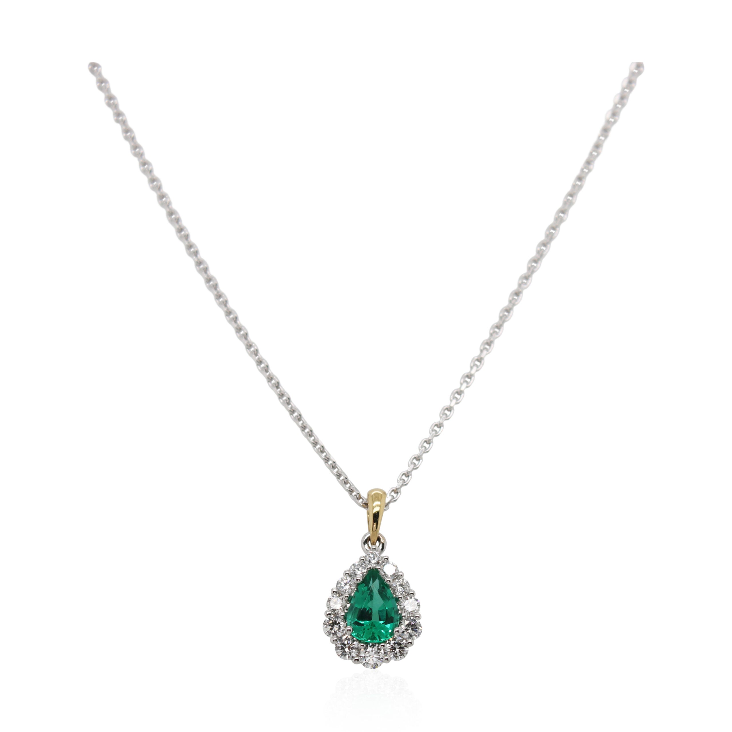 0.58ct Pear Shaped Emerald and Halo Diamond Pendant