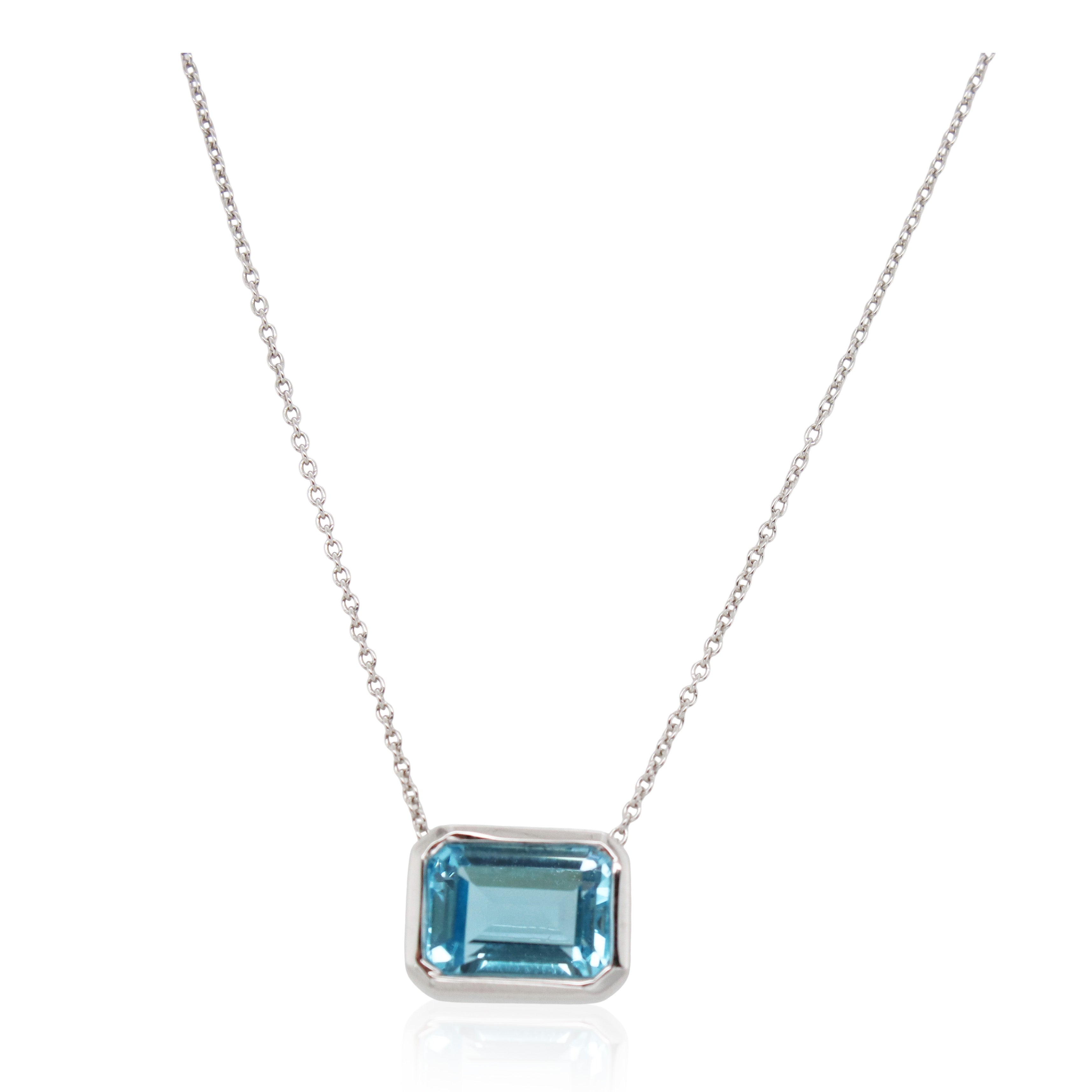 Emerald Cut Bezel Set Blue Topaz Solitaire Pendant
