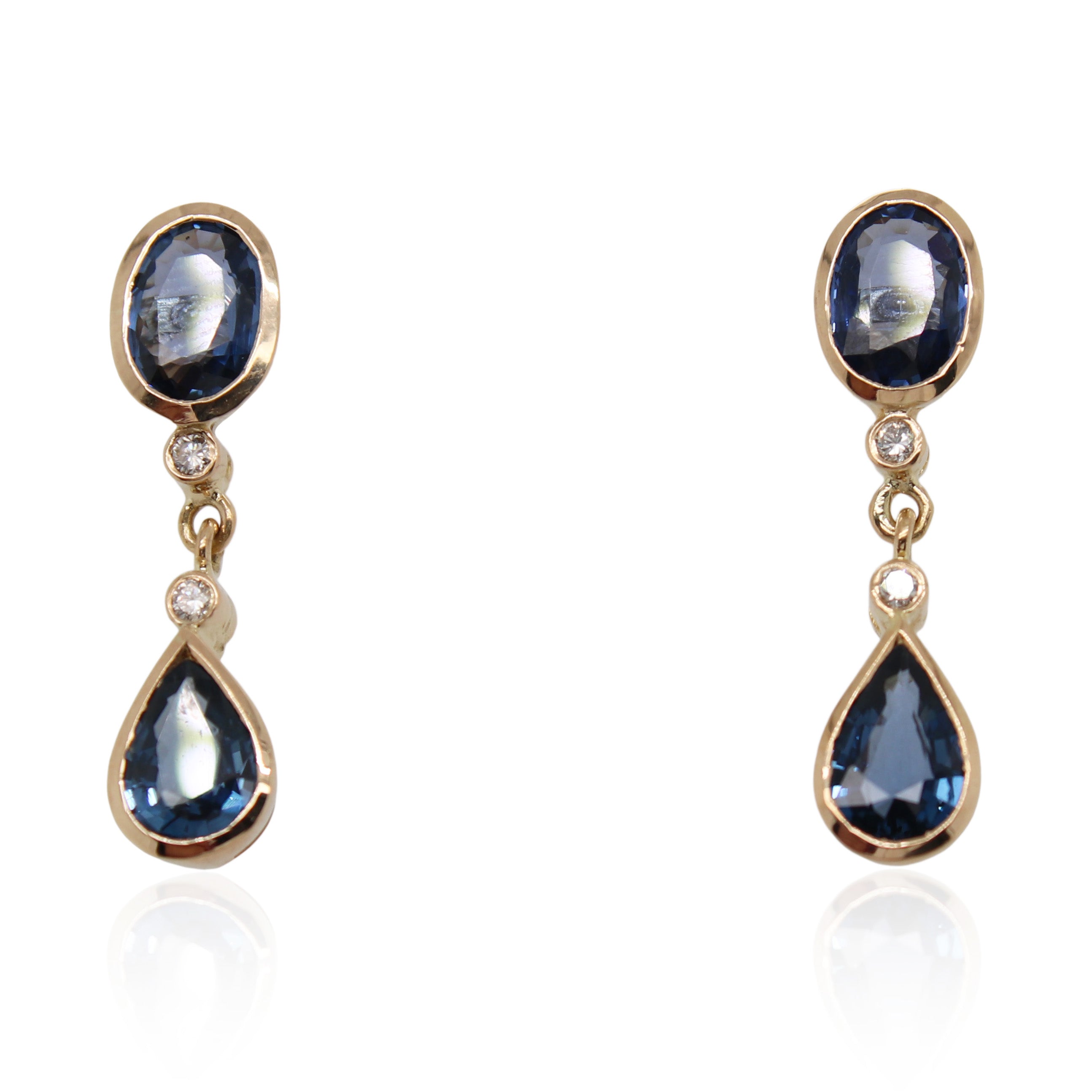 Oval and Pear Shaped Sapphire and Diamond Dangle Earrings