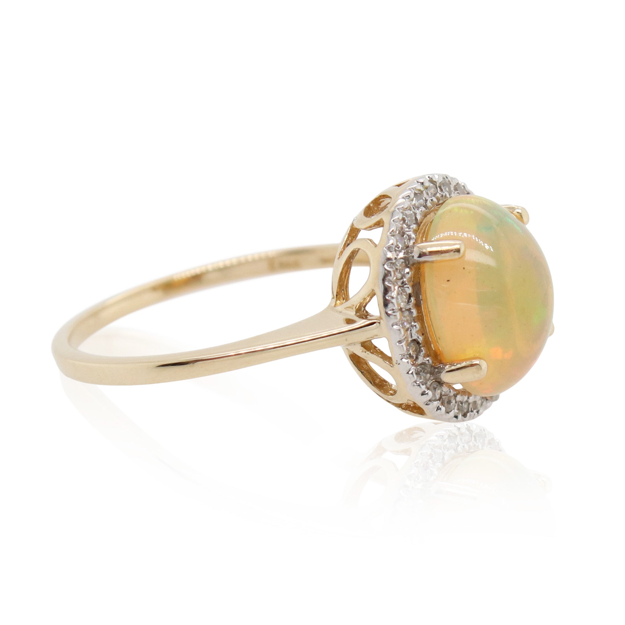 Estate Oval Opal and Halo Diamond Ring