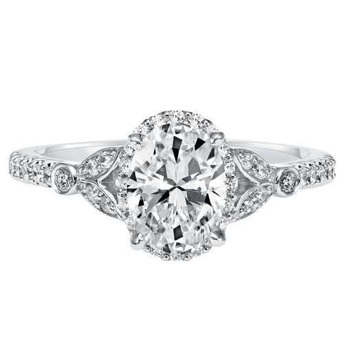 Oval Shaped Diamond Floral Halo Engagement Ring