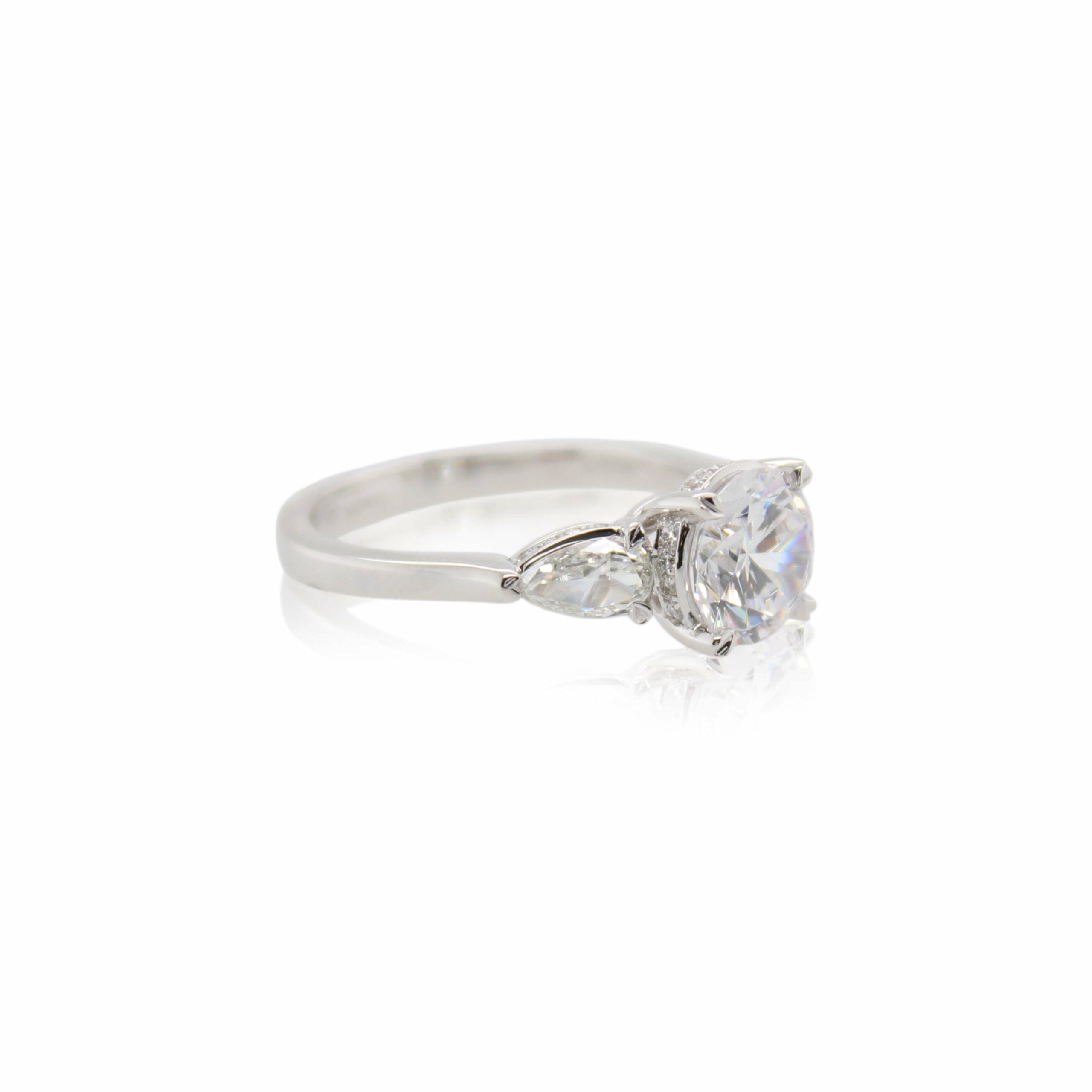 Crisscut New York Diamond Pear Accent Engagement Ring