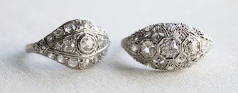 Two vintage diamond rings set side by side