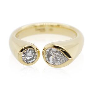 Pear Shaped and Round Diamond Ring