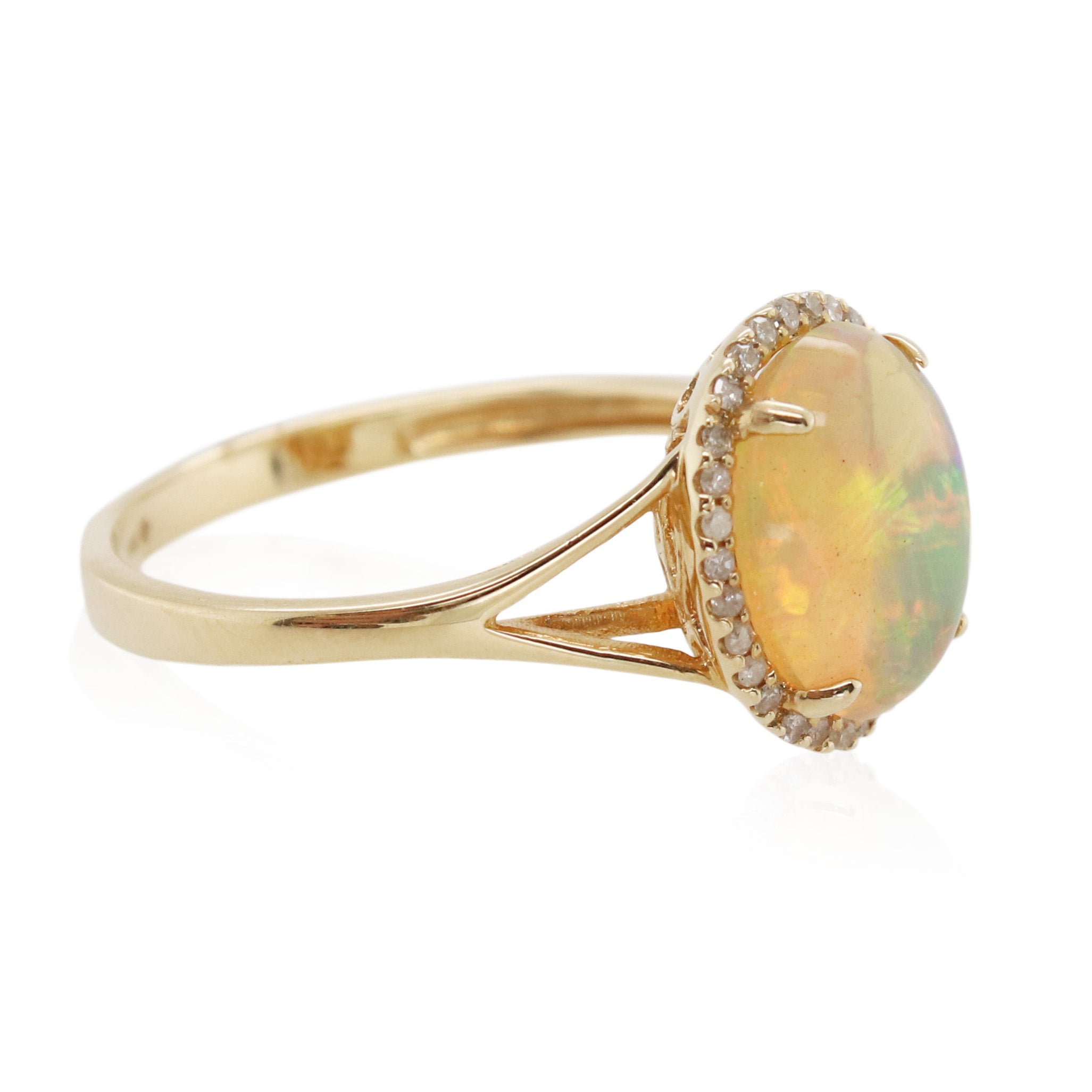 Oval Cabochon Opal and Diamond Ring