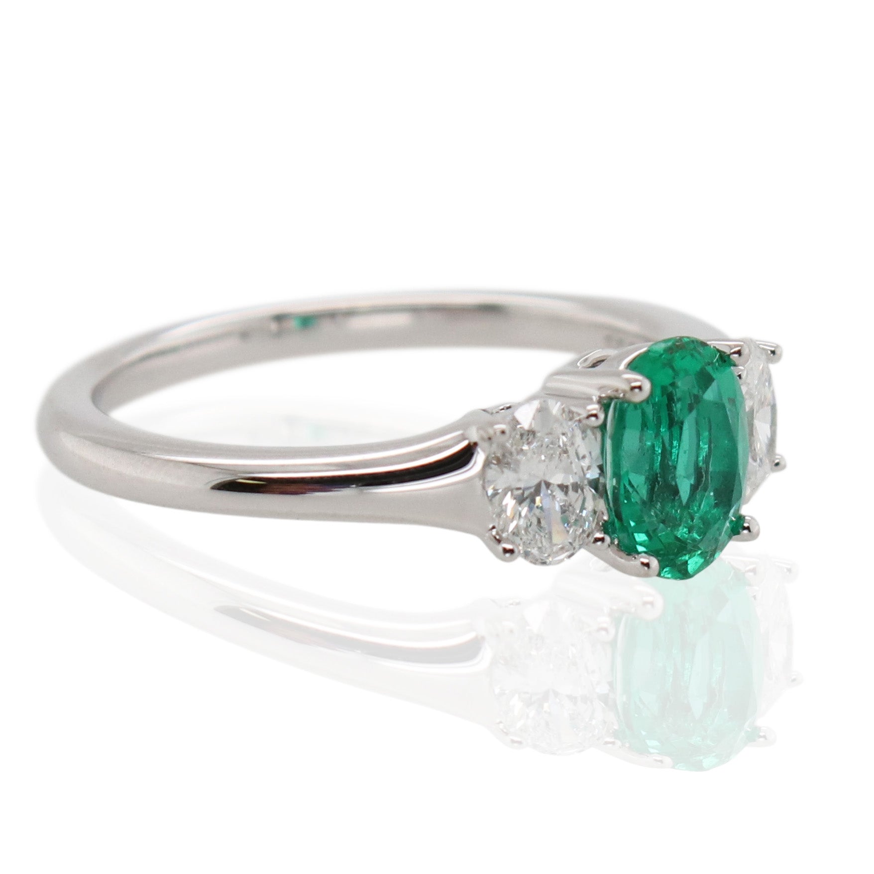 0.80ct Emerald and Diamond 3 Stone Ring
