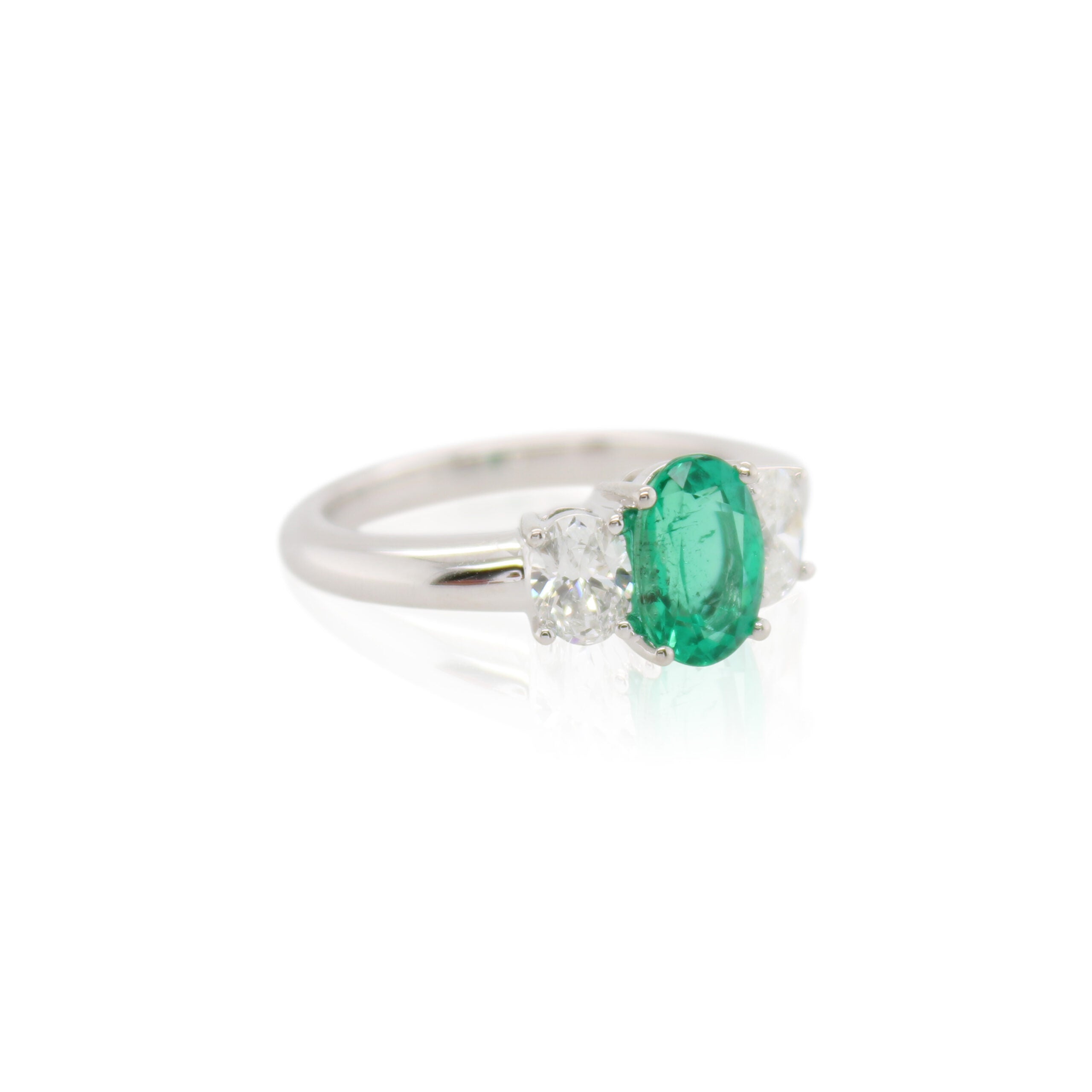 Oval Emerald and Diamond Three Stone Ring