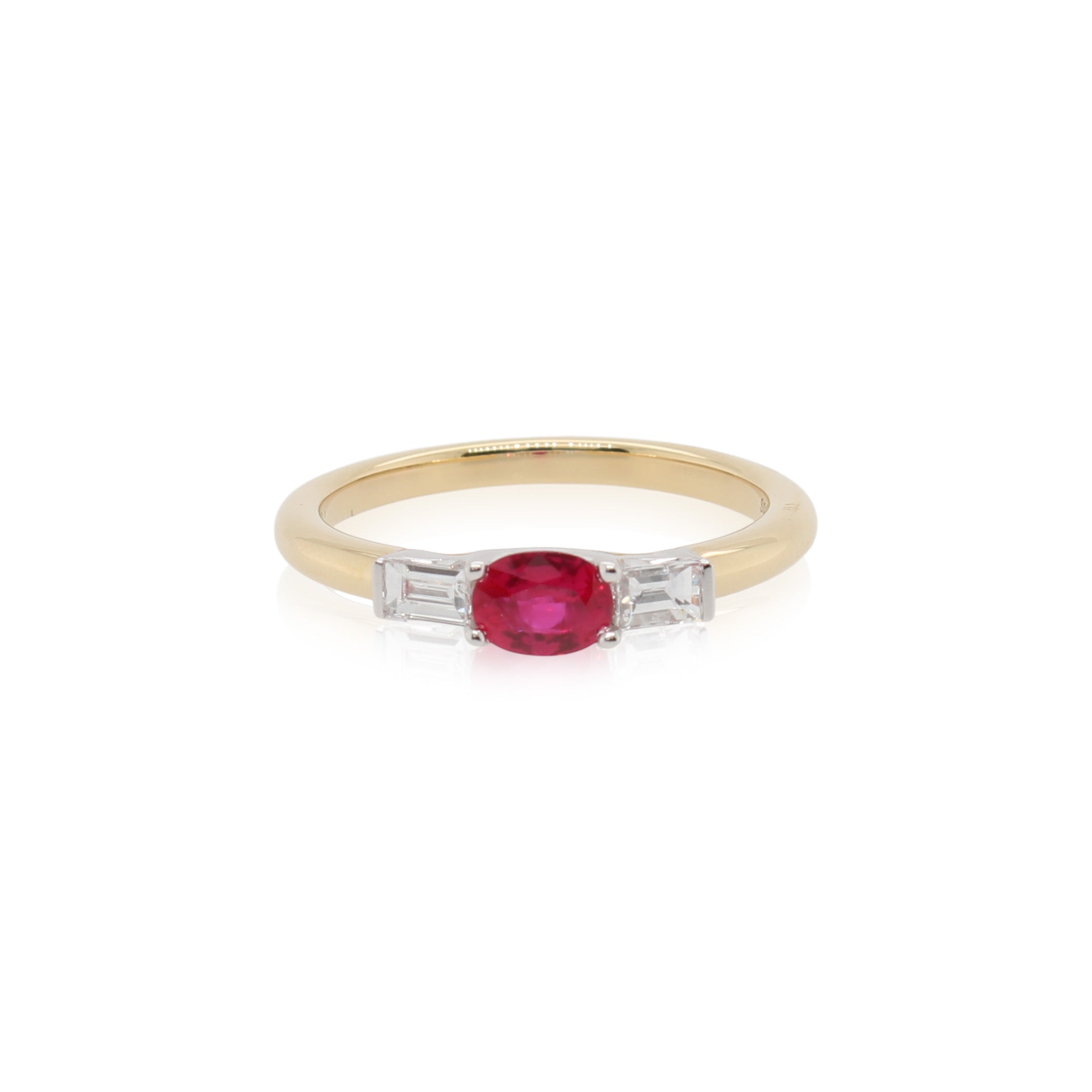 Oval Ruby and Diamond Three Stone Ring