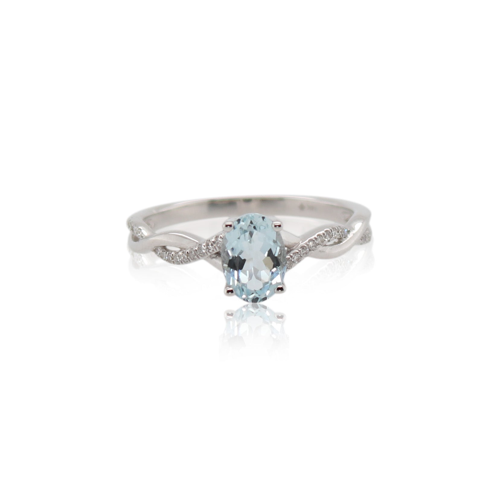 Oval Aquamarine and Diamond Twist Ring