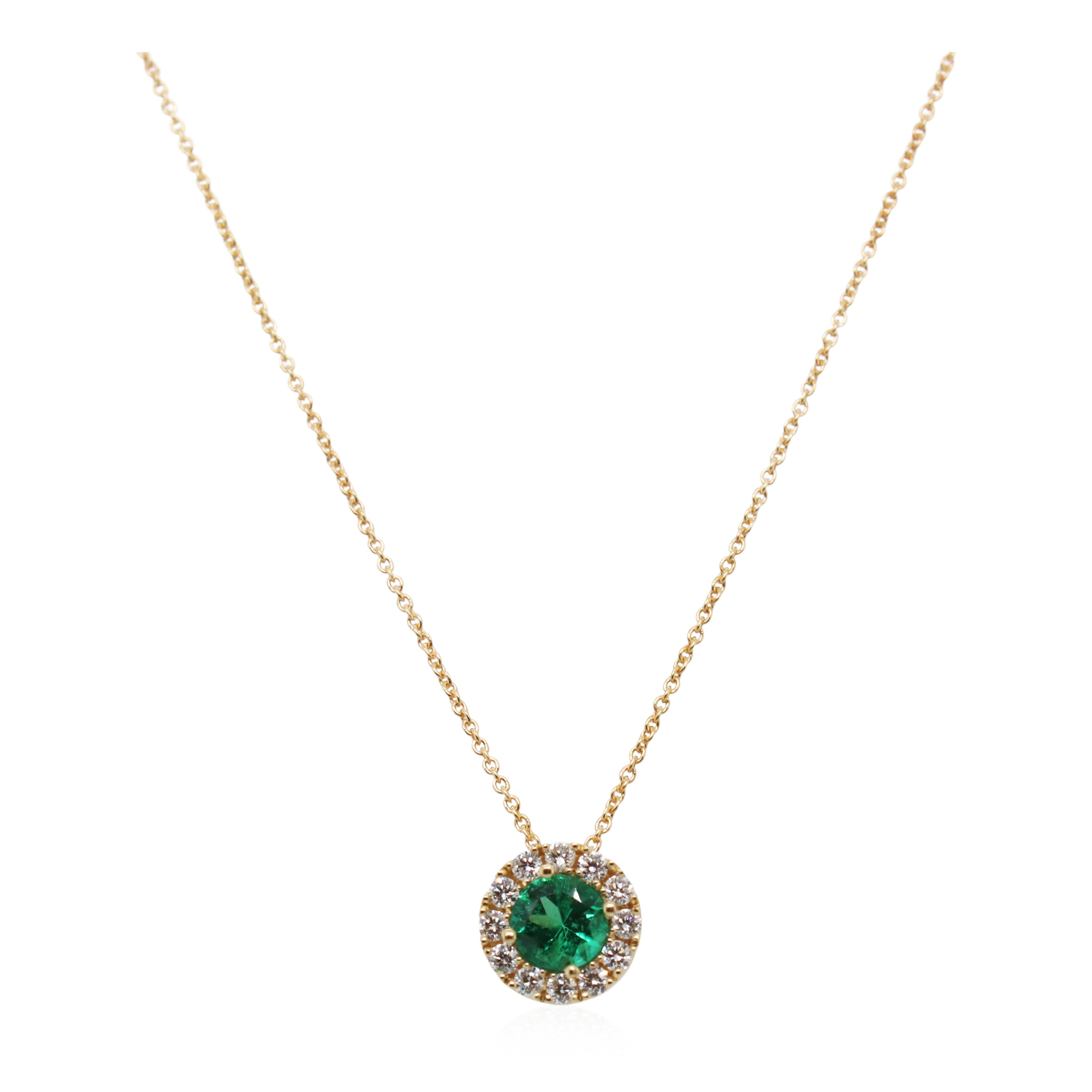 0.25ct Emerald and Diamond Halo Pendant