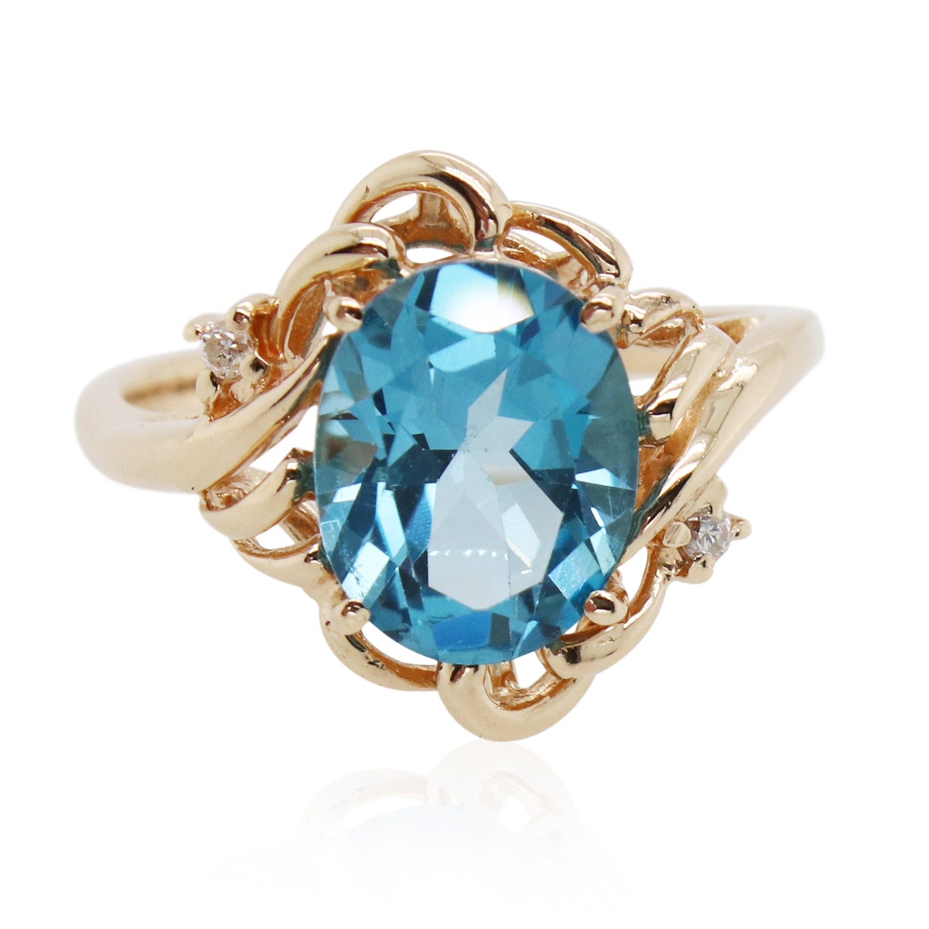 Oval Blue Topaz and Diamond Ring