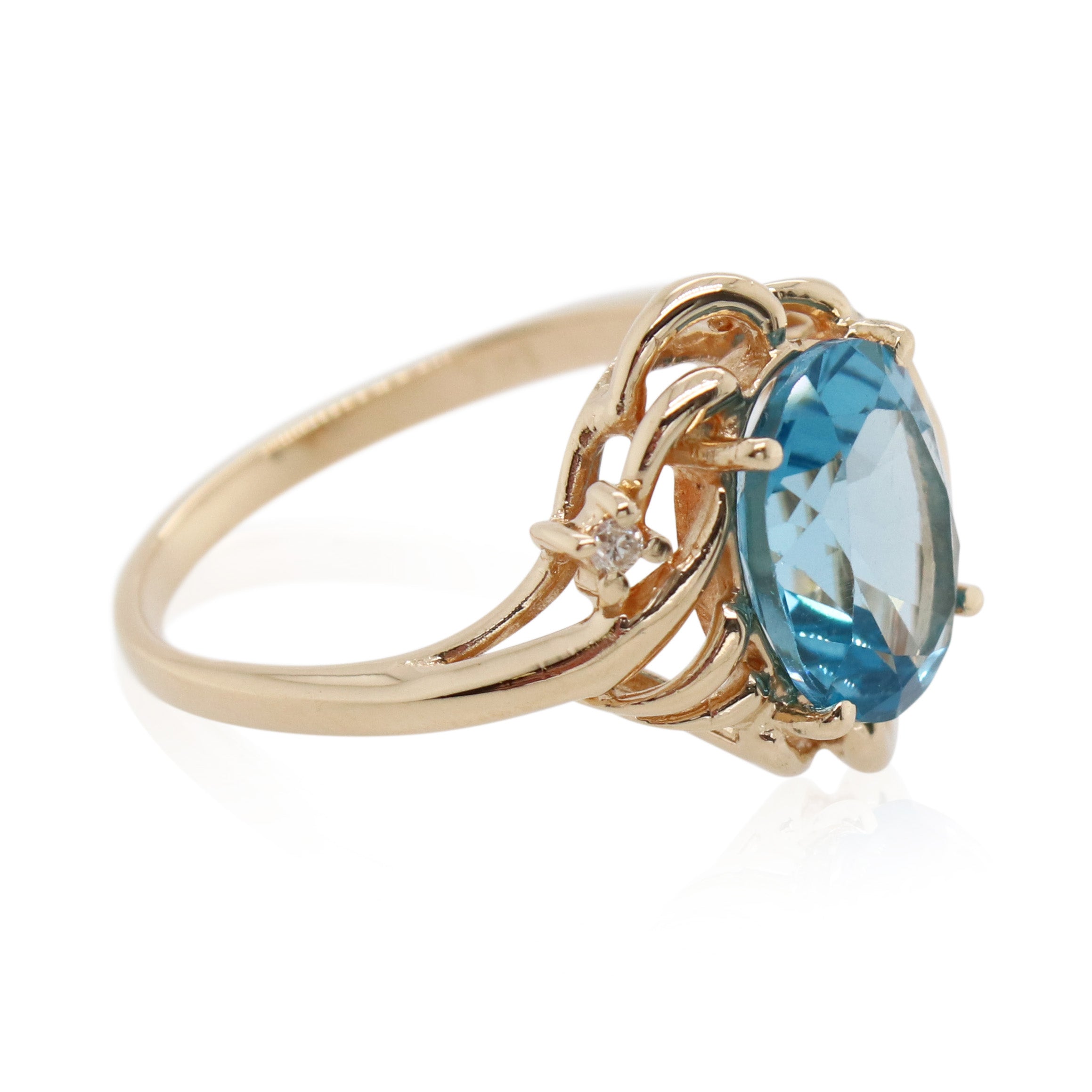 Oval Blue Topaz and Diamond Ring