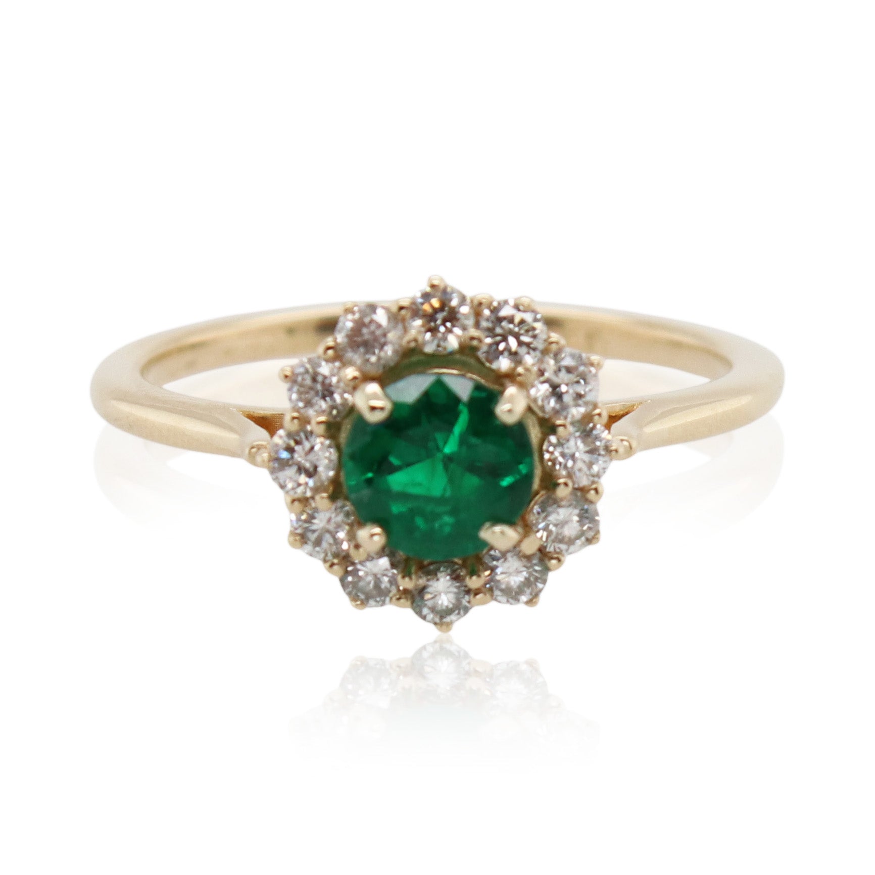 0.33ct Emerald and Halo Diamond Ring