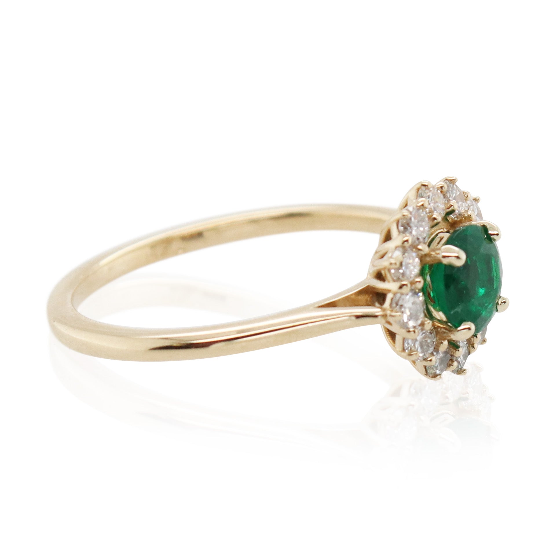 0.33ct Emerald and Halo Diamond Ring