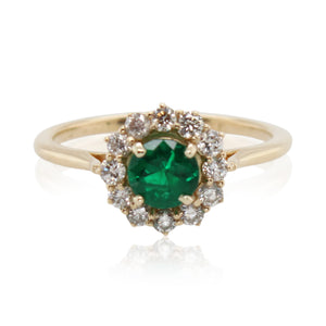 0.33ct Emerald and Halo Diamond Ring