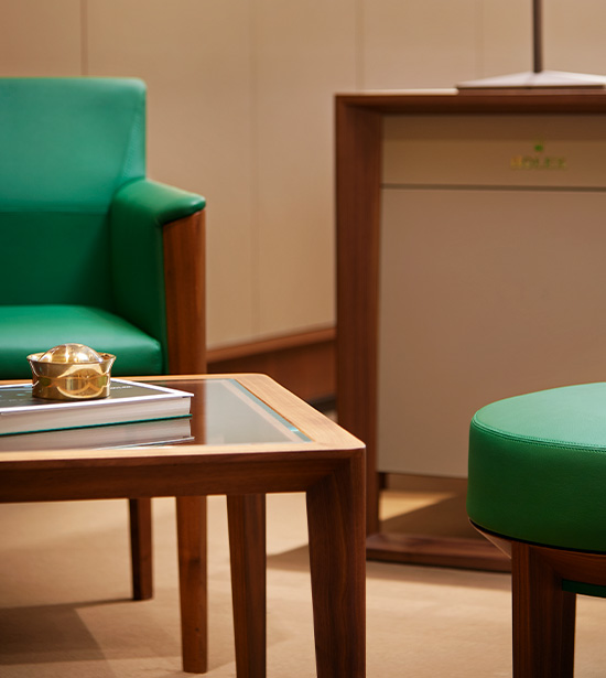rolex green chairs in a room
