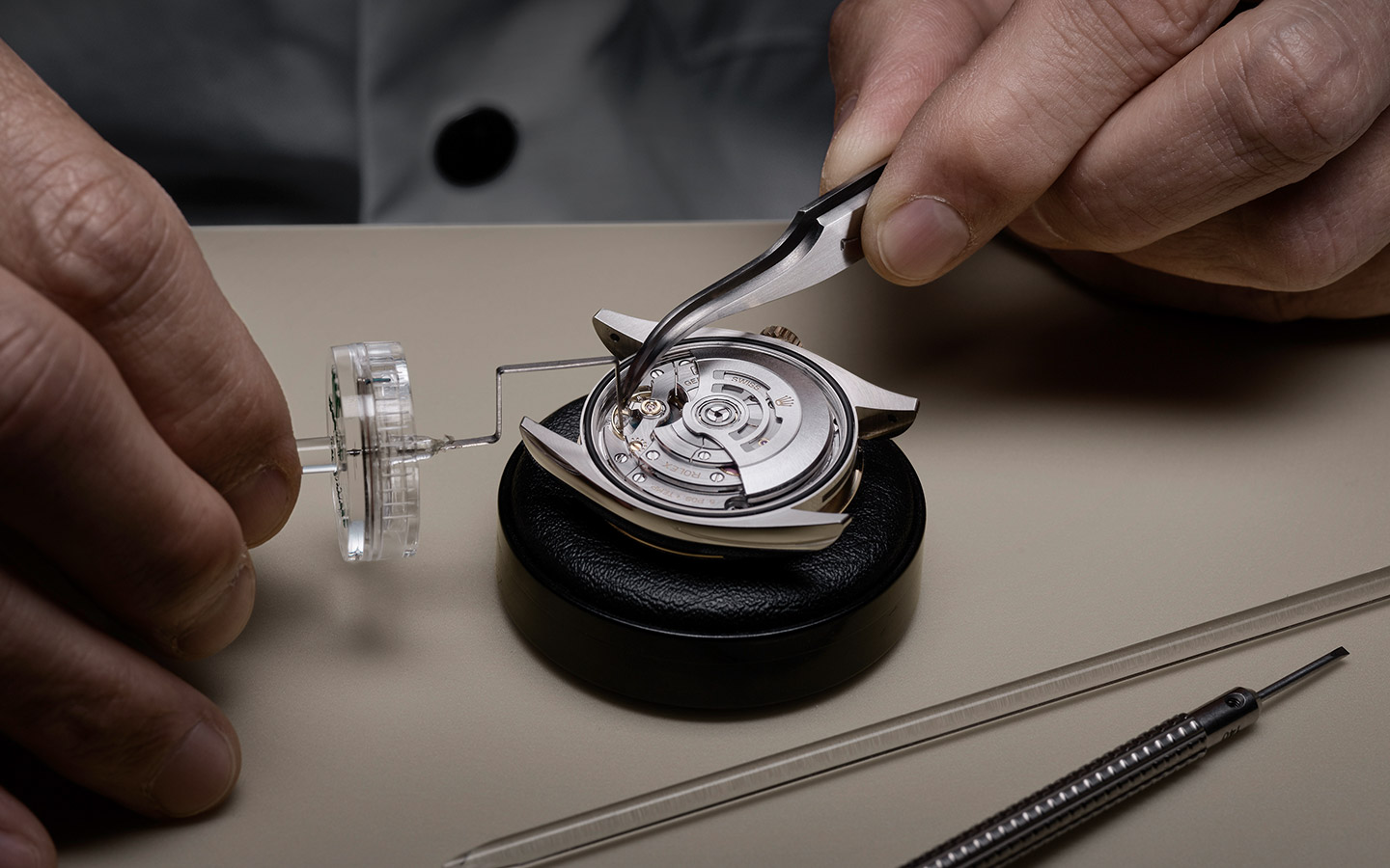 rolex watch being tested for precision