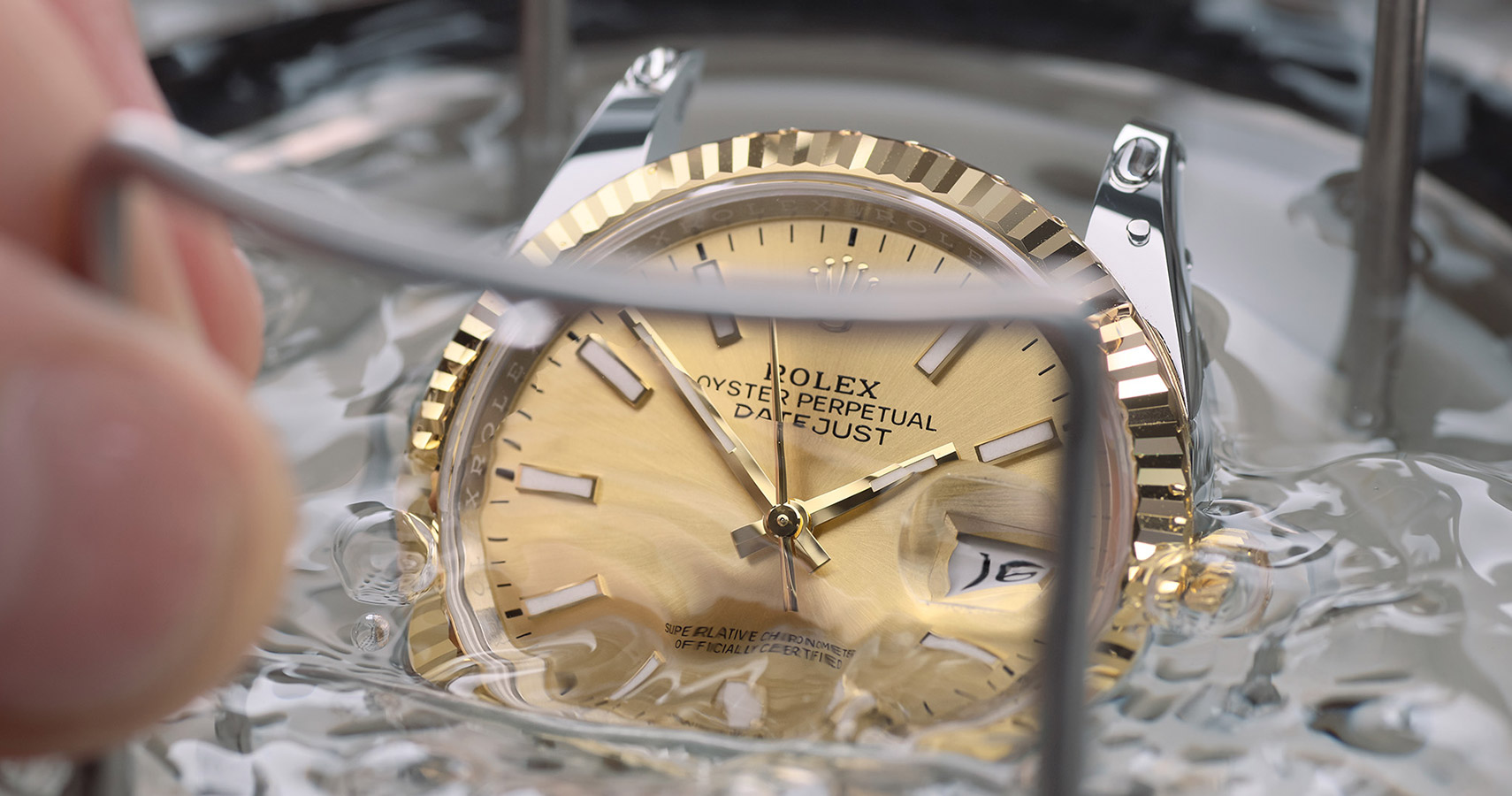 rolex watch being tested for waterproofness