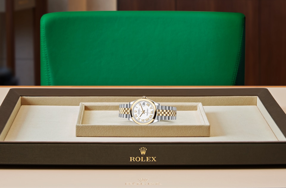 Rolex Datejust 31 displayed on a tray