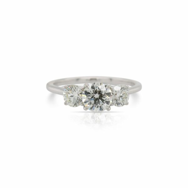 This 3 stone diamond engagement ring by The Forevermark Tribute™ Collection is crafted from 18k white gold and features a 0.71 carat center diamond and 0.65 total carat side diamonds.