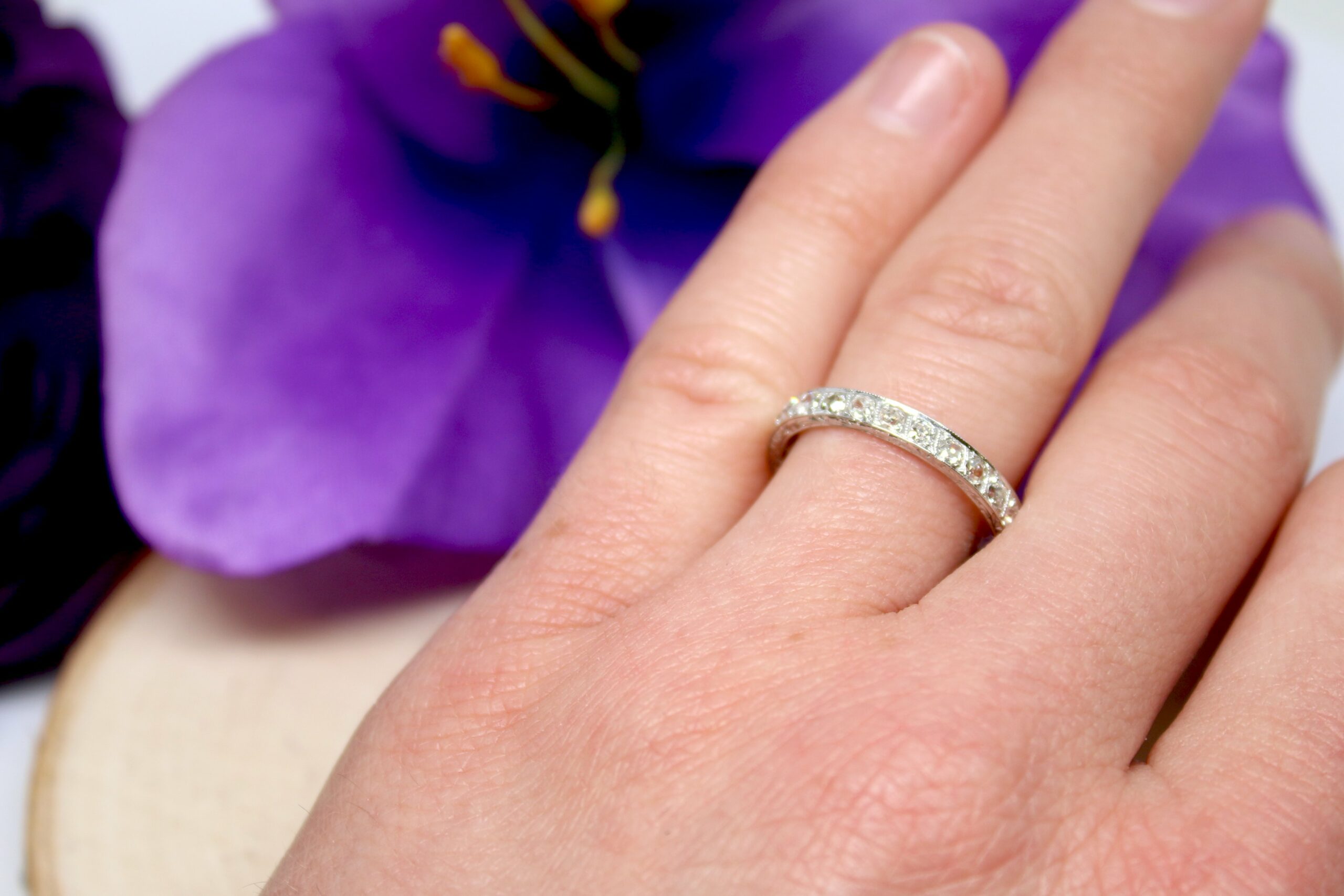 A small diamond banded ring.
