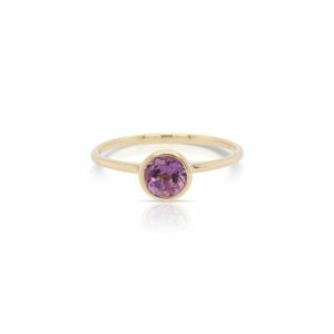 This solitaire amethyst ring by Rafael is crafted from 14k yellow gold and features a 0.50 carat round amethyst.