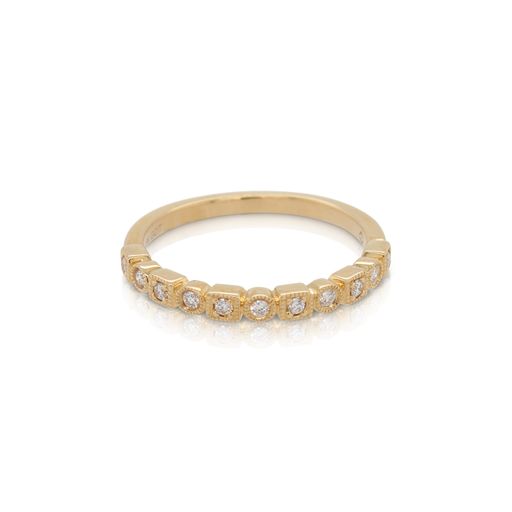 This stackable diamond ring from Forevermark Tribute™ Collection is crafted from 18k yellow gold and features 0.12 total carats of diamonds surrounded by alternating square and round milgrain halos.