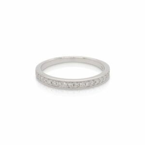 This diamond stackable ring from Forevermark Tribute™ Collection is crafted from 18k white gold and features 0.20 total carats of diamonds with a milgrain edge.