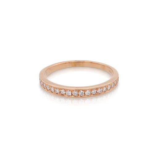 This diamond stackable ring from Forevermark Tribute™ Collection is crafted from 18k rose gold and features 0.20 total carats of diamonds with a milgrain edge.