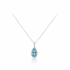 This blue topaz and diamond necklace by Rafael is crafted from 14k white gold and features a 1.25 carat pear shaped blue topaz and 0.08 total carats of diamonds.