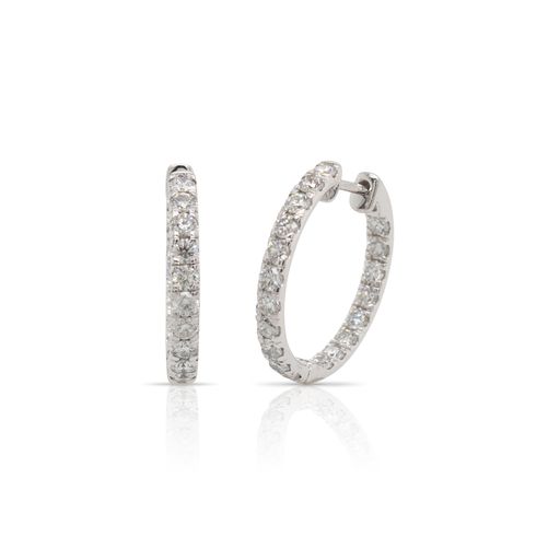 This pair of diamond hoop earrings from Forevermark Tribute™ Collection is crafted from 18k white gold and features 2.00 total carats of diamonds.