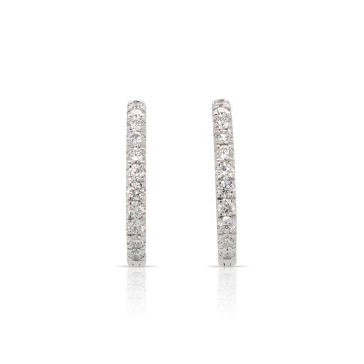 This pair of diamond oval hoop earrings from Forevermark Tribute™ Collection is crafted from 18k white gold and features 2.00 total carats of diamonds.