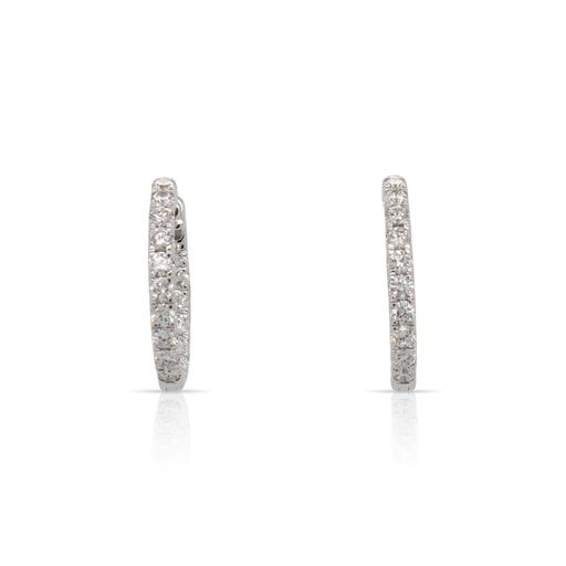 This pair of diamond oval hoop earrings from Forevermark Tribute™ Collection is crafted from 18k white gold and features 1.50 total carats of diamonds.