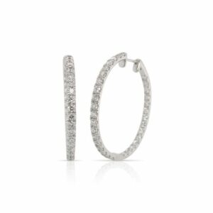 This pair of diamond hoop earrings from Forevermark Tribute™ Collection is crafted from 14k white gold and features 6.00 total carats of diamonds.