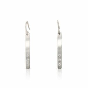 This pair of Anticipation diamond earrings by Ed Levin is crafted from sterling silver and features three diamonds.
