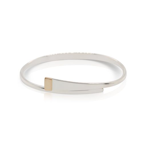 This Sashay Swing bracelet by Ed Levin is crafted from sterling silver and features 14k yellow gold details.