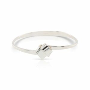 This Love Knot bracelet by Ed Levin is crafted from sterling silver and features a Celtic knot.