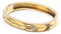 Gold leaf engraved ring.