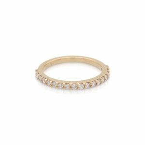 This diamond half round band by R. F. Moller Designs is crafted from 14k yellow gold and features 1/3 total carats of diamonds.