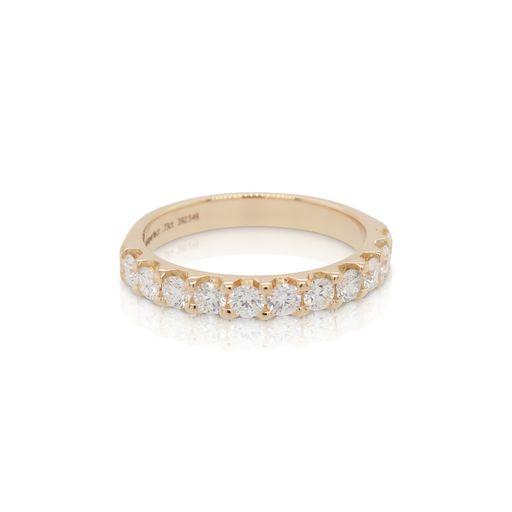 This 11 stone diamond ring is crafted from 14k yellow gold and features 0.73 total carats of diamonds.