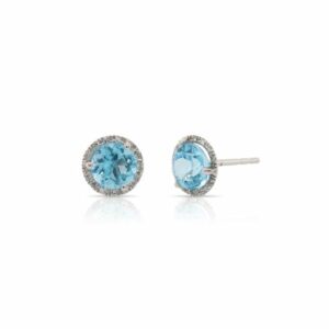 This pair of blue topaz and diamond earrings by Rafael is crafted from 14k white gold and features 2.25 total carats of round blue topaz and 0.08 total carats of diamonds around the halo.