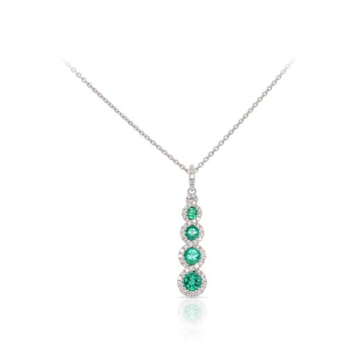 This emerald and diamond necklace by Spark Creations is crafted from 18k white gold and features 0.53 total carats of emeralds and 0.18 total carats of diamonds around the halos.