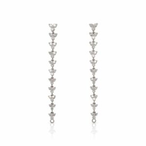 This pair of dangle earrings by Roberto Coin is crafted from 18k white gold and features 1.88 total carats of diamonds and are able to convert from long dangle earrings to shorter earrings.