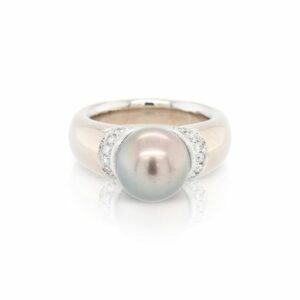 This ring is crafted from 18k white gold and features a large black Tahitian pearl and 0.27 total carats of diamonds.