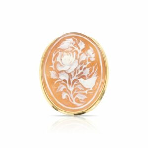This brooch is crafted from from 18k yellow gold and features a beautiful intricately carved rose and bird cameo.